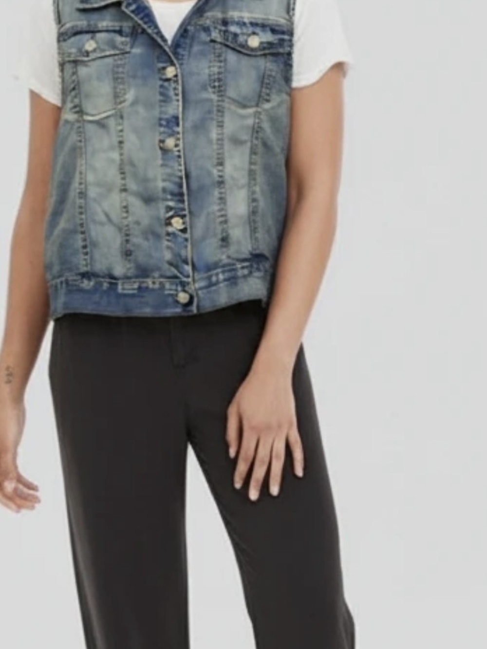 Mudd branded blue denim vest with a gray hooded insert.Mudd |